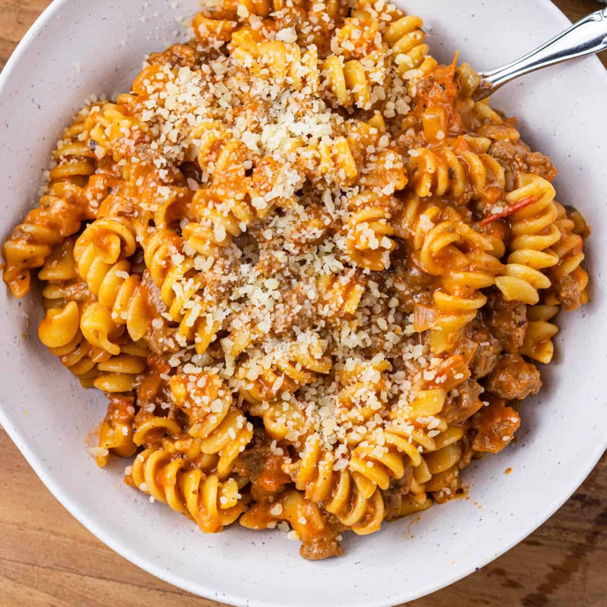 beef pasta with parmesan plated