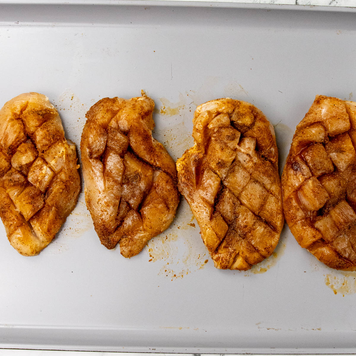 Raw Crosshatch and Seasoned Chicken